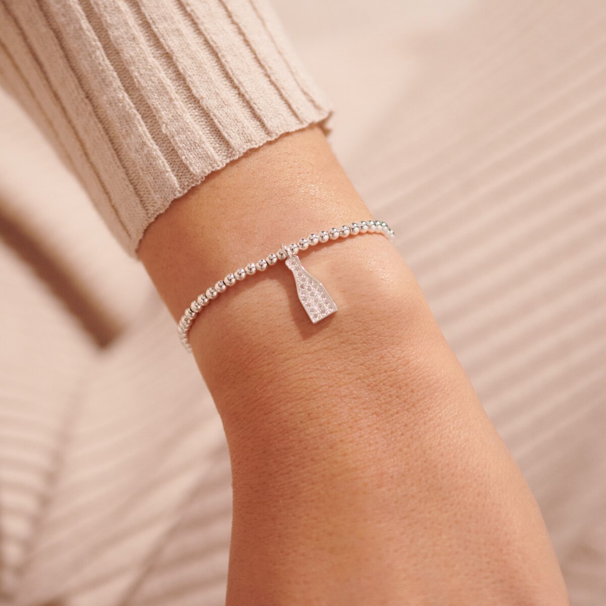 JJ Calls for champagne bracelet
